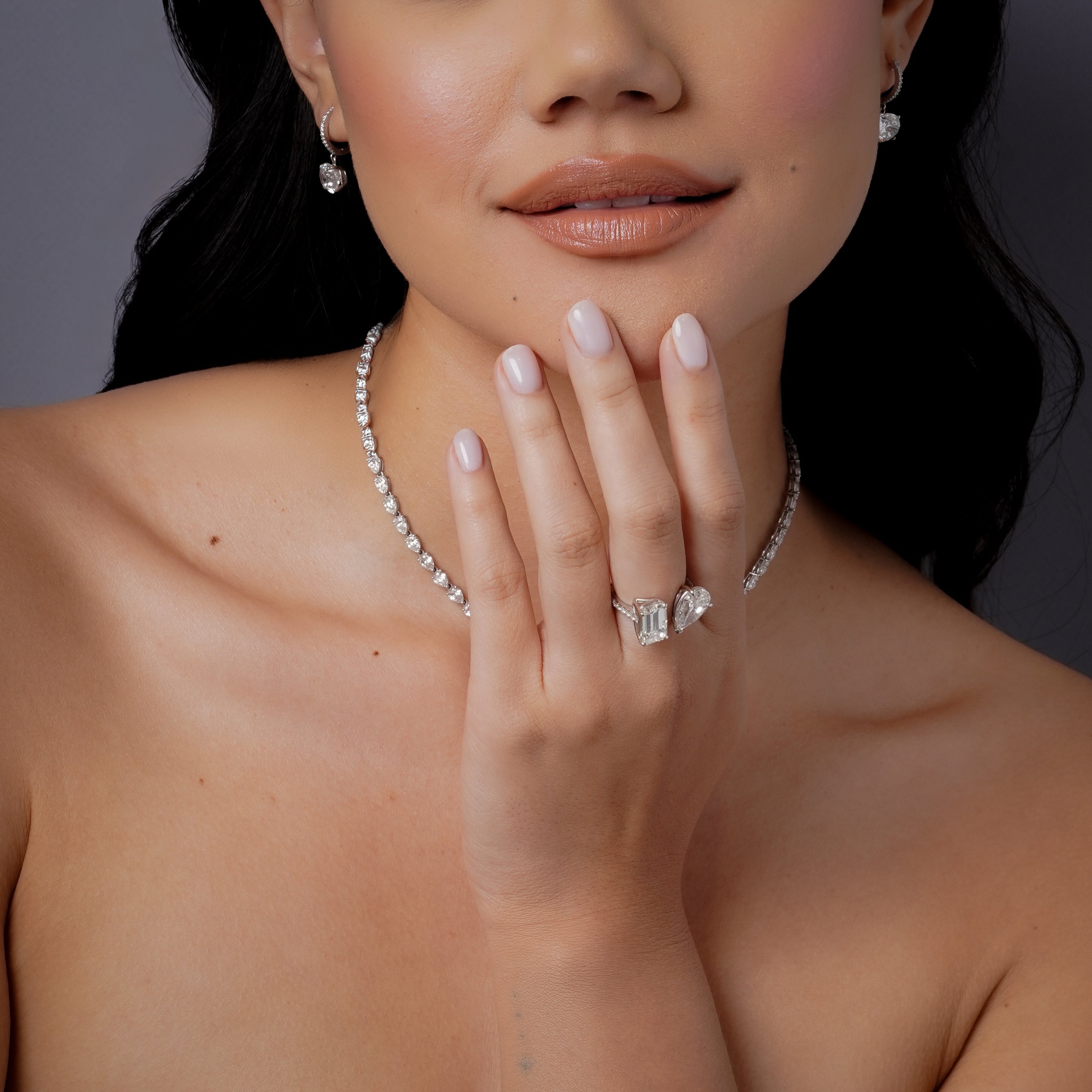 DIAMOND EMERALD & PEAR TWIN RING