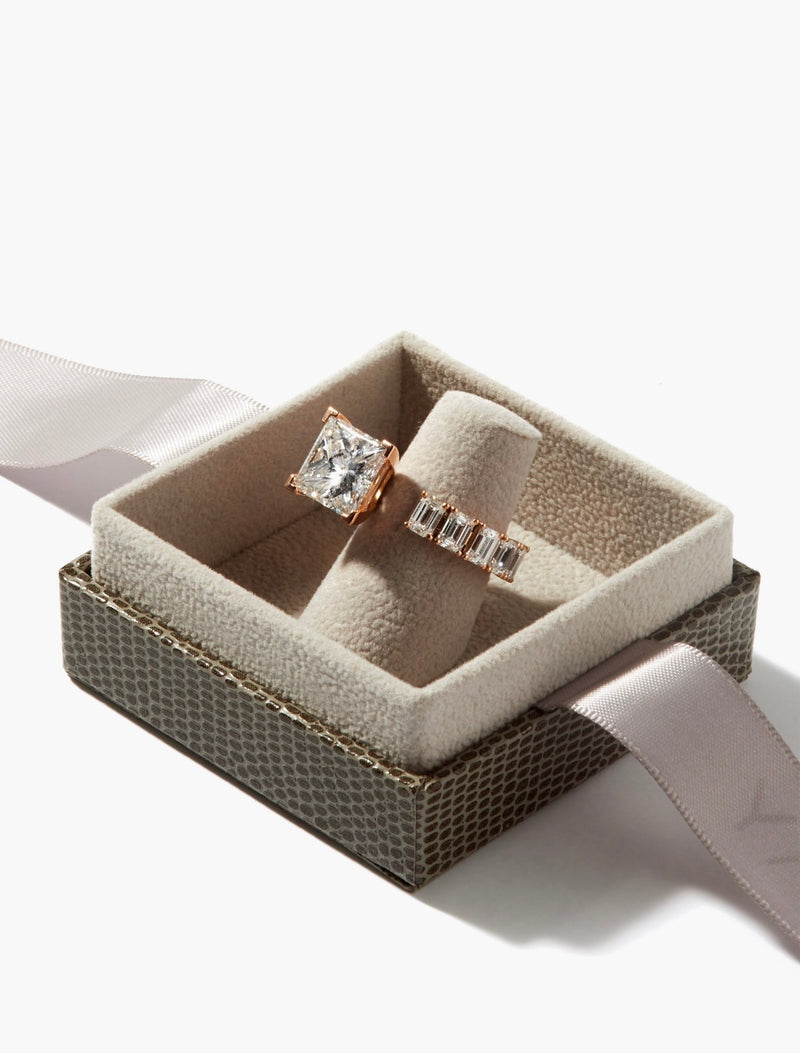 FLOATING PRINCESS DIAMOND RING